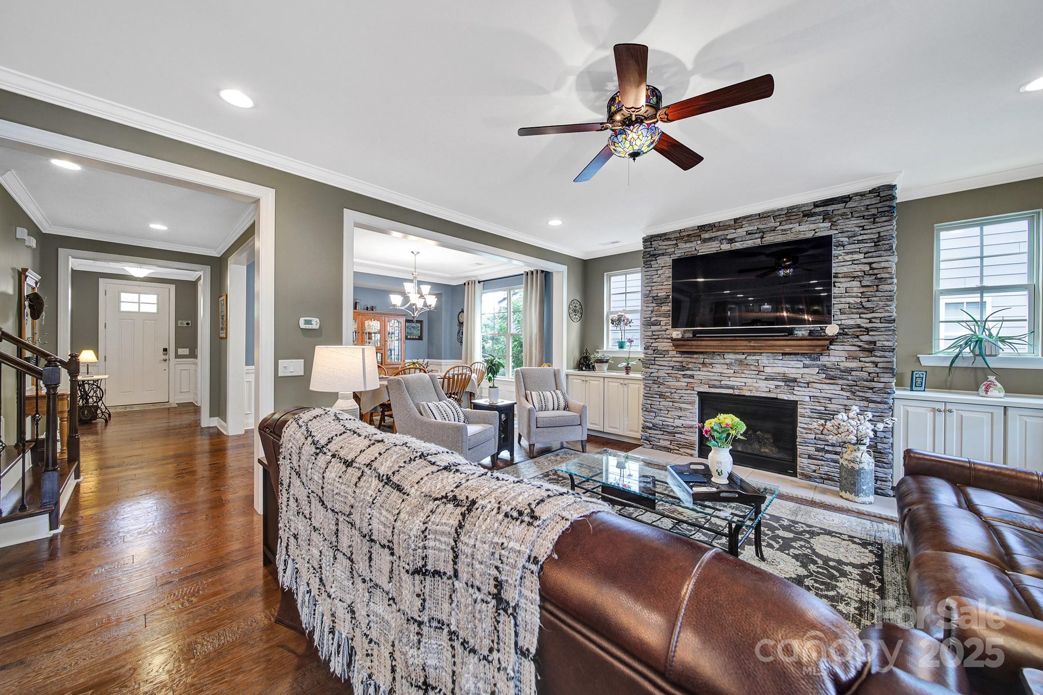 998 Emory Lane Fort Mill, SC 29708 - Photo 13 of 48 a living room with furniture fireplace and a flat screen tv