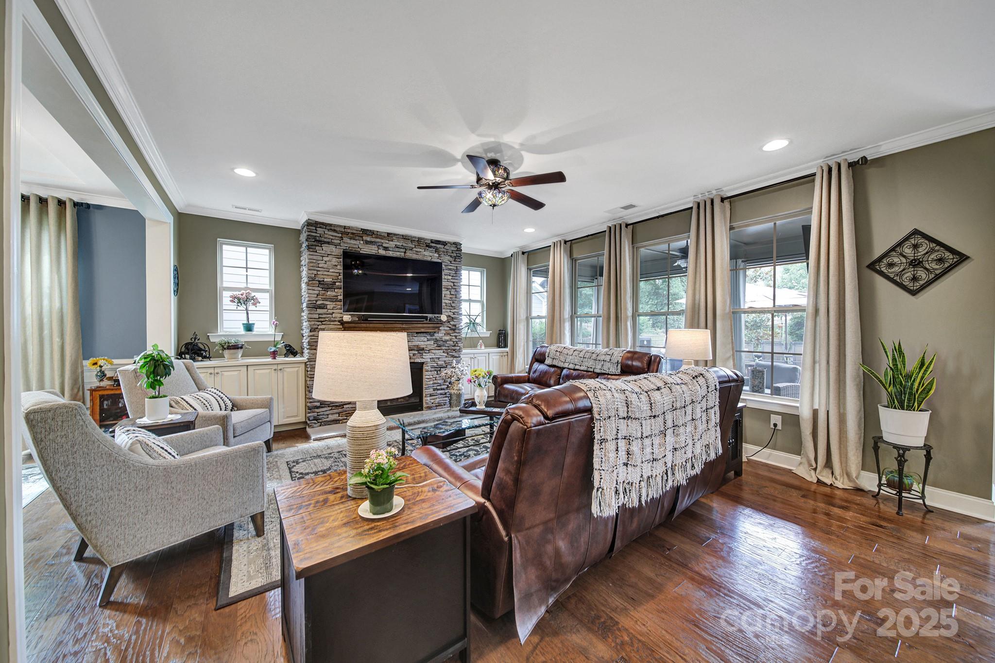 998 Emory Lane Fort Mill, SC 29708 - Photo 14 of 48 a living room with fireplace furniture and a wooden floor