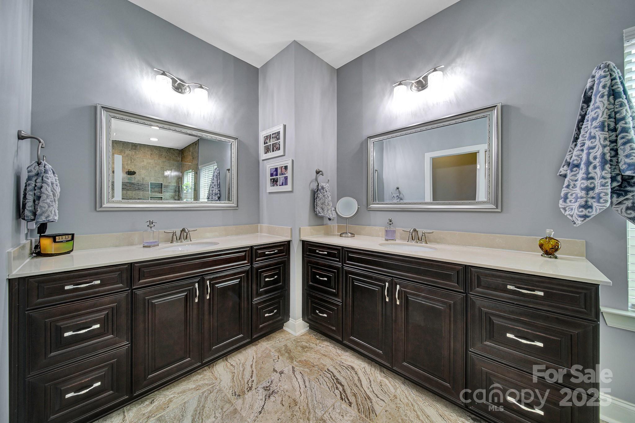 998 Emory Lane Fort Mill, SC 29708 - Photo 24 of 48 a spacious bathroom with a sink and a mirror