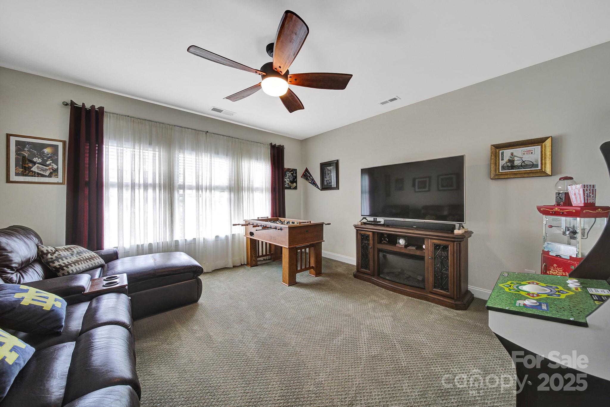 998 Emory Lane Fort Mill, SC 29708 - Photo 26 of 48 a living room with furniture and a flat screen tv