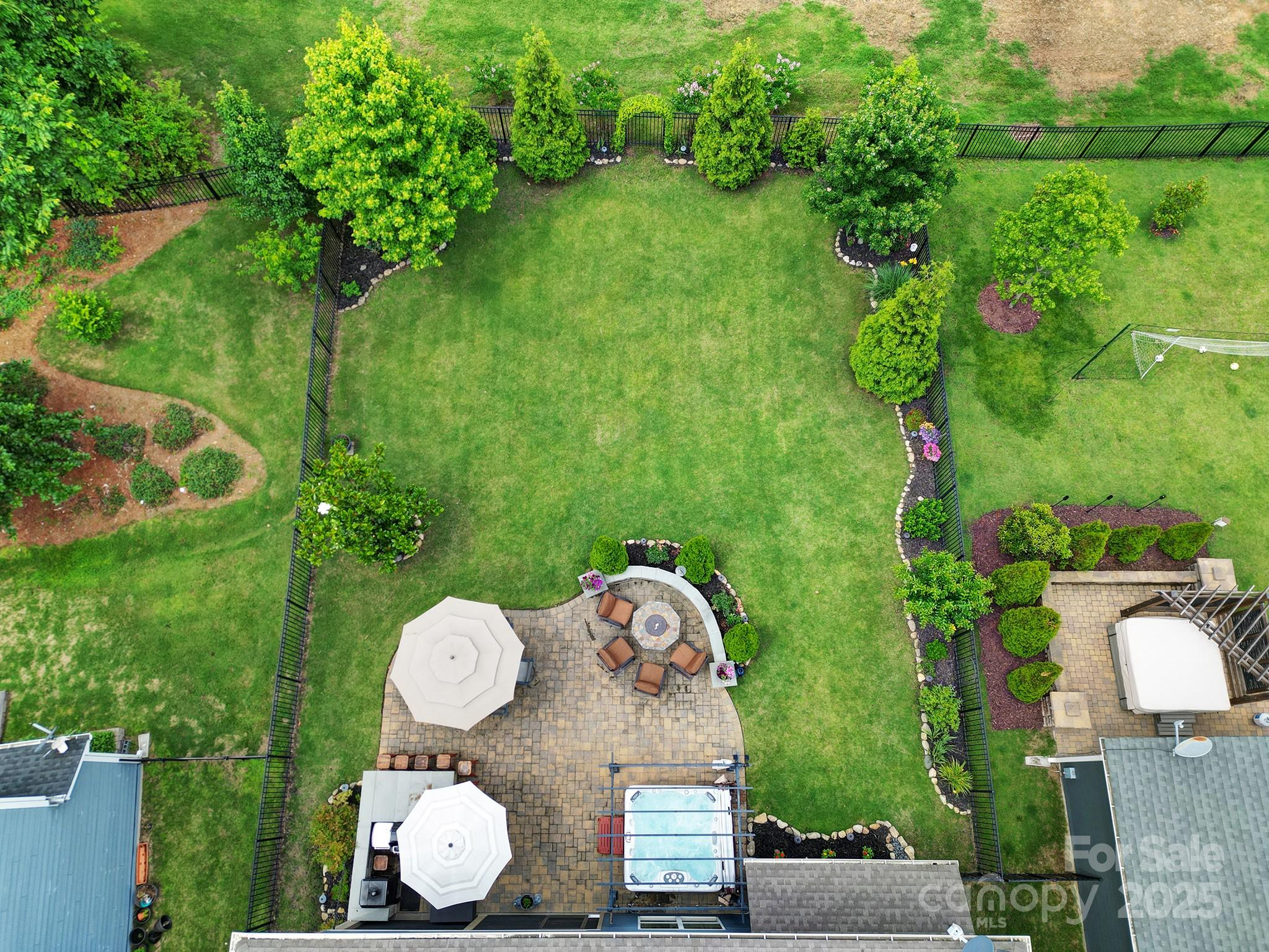 998 Emory Lane Fort Mill, SC 29708 - Photo 44 of 48 an aerial view of a house with garden space and outdoor seating