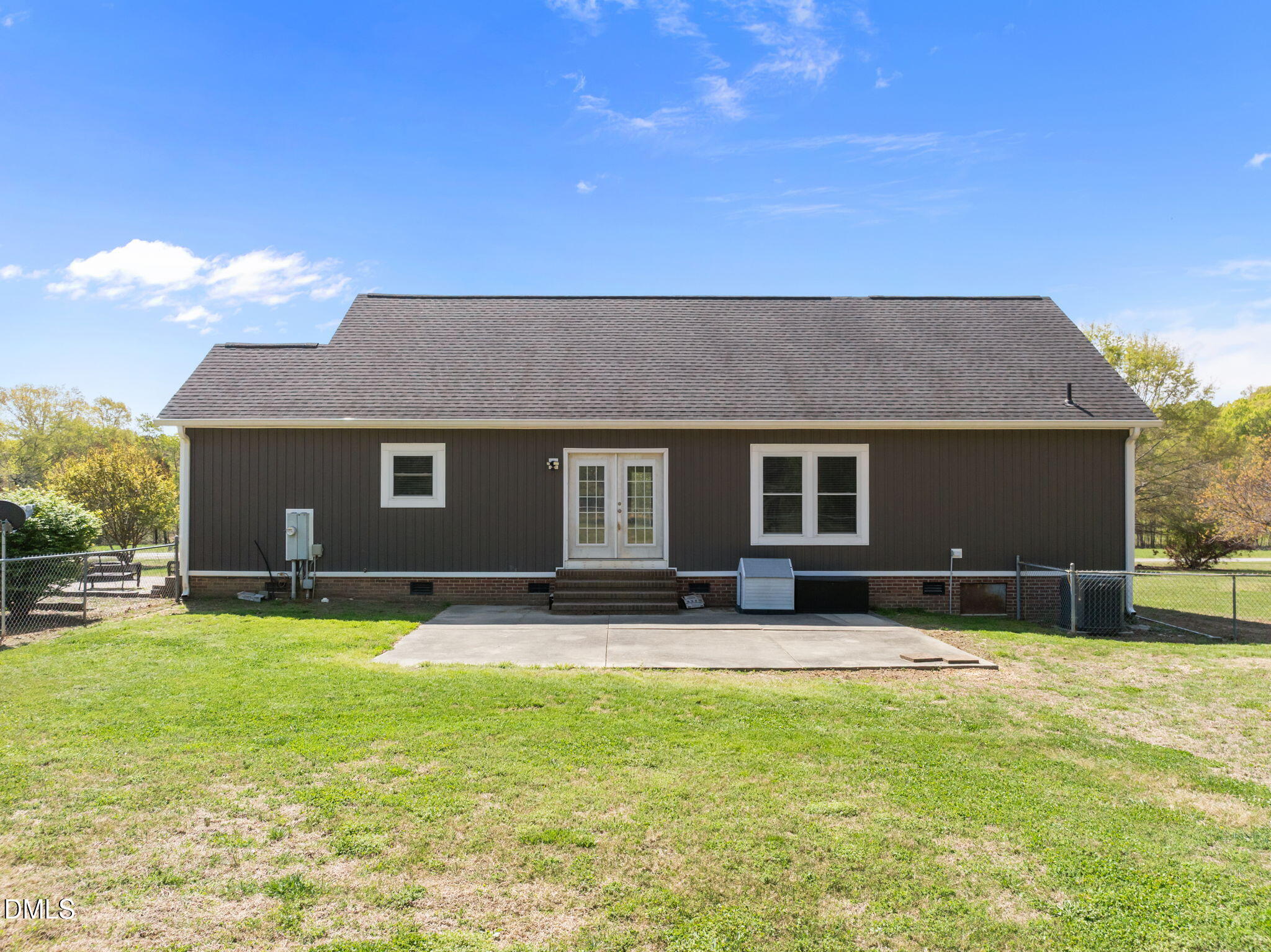 236 Dirgie Mine Road Roxboro, NC 27574 - Photo 46 of 55 a house view with a sitting space and garden