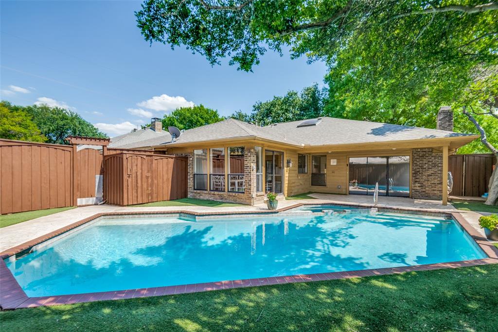 4309 Eldorado Drive Plano, TX 75093 - Photo 1 of 1 Sparkling pool with a covered patio