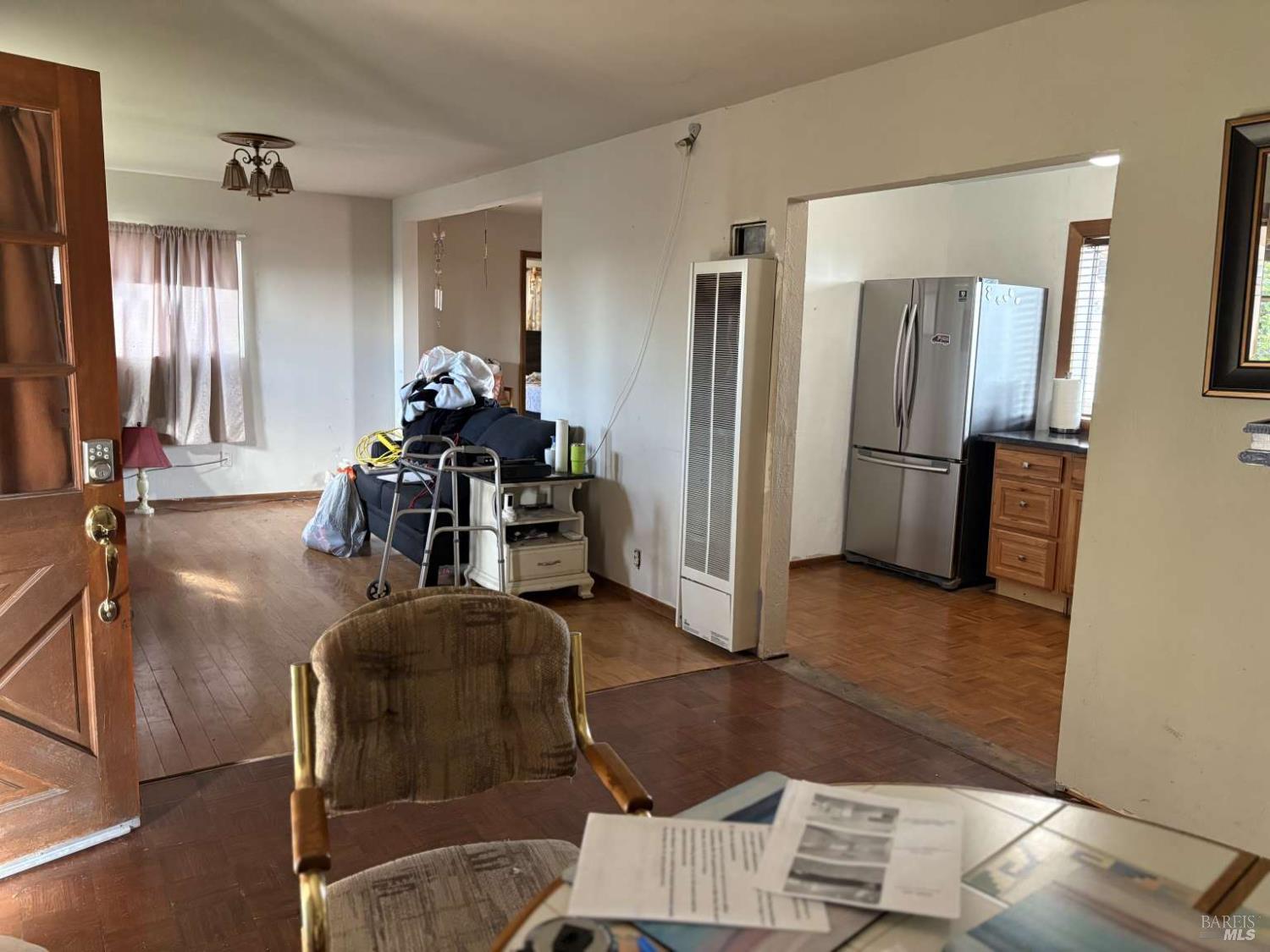 2808 Fulton Road Fulton, CA 95439 - Photo 5 of 15 a living room with furniture a large window and a wooden floor