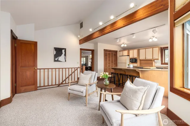 a living room with furniture and a table