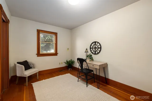 a workspace with furniture and window