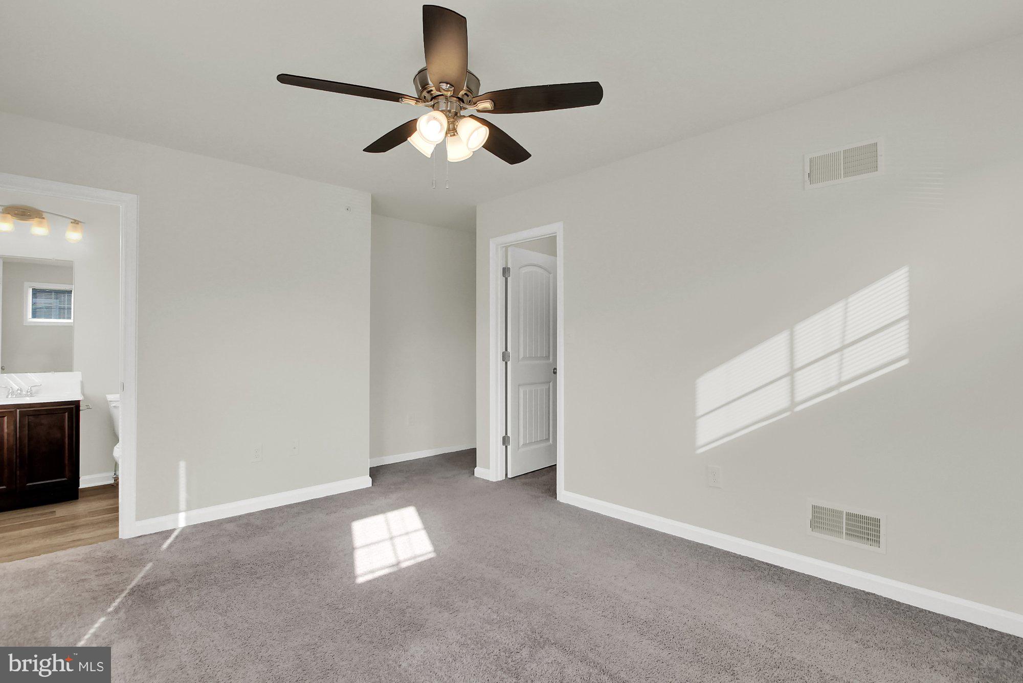 51 Overlook Dr., Unit J Hanover, PA 17331 - Photo 5 of 13 an empty room with closet area