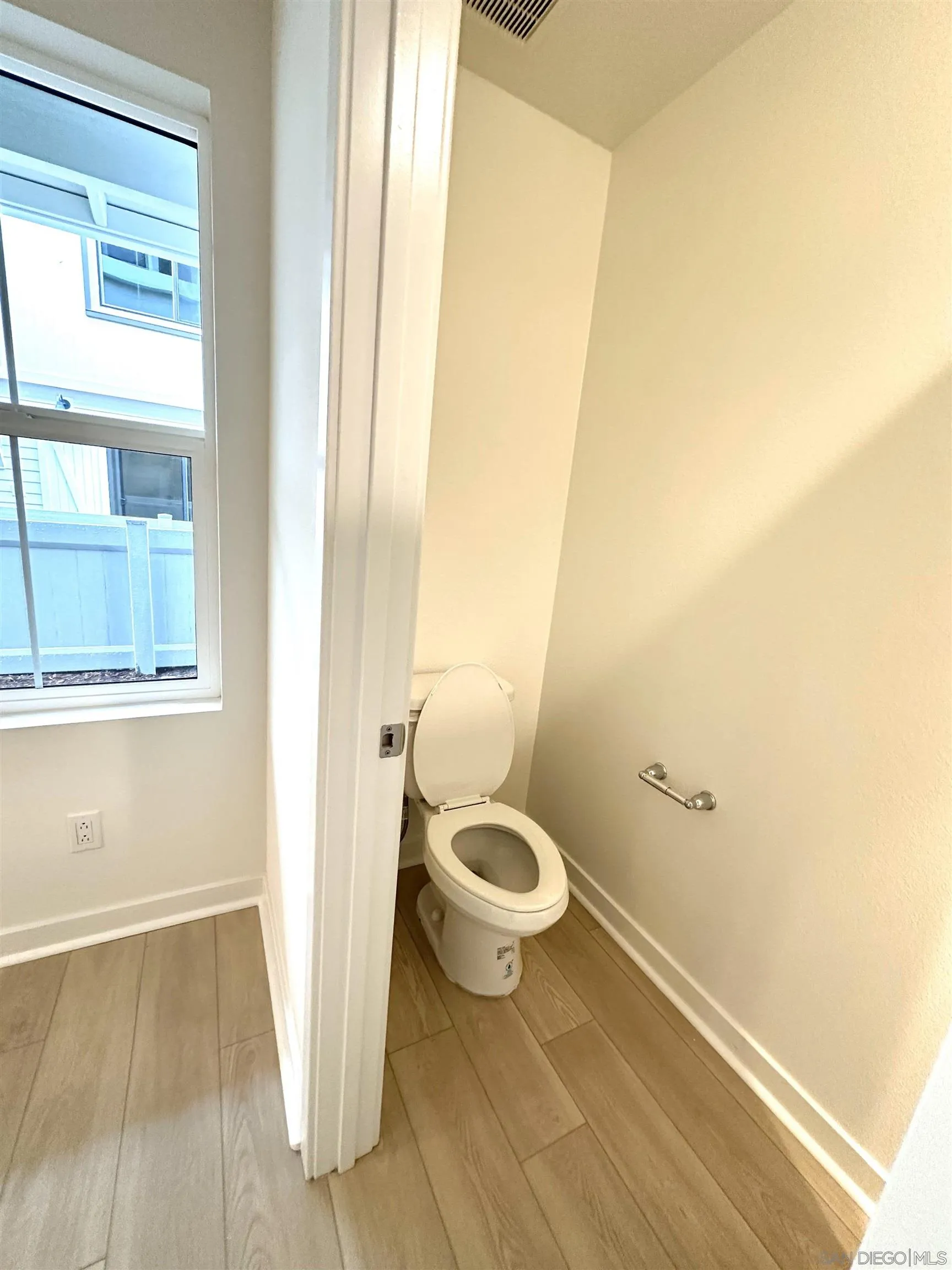 2511 Chamomile Lane Carlsbad, CA 92008 - Photo 20 of 51 a bathroom with a sink and a toilet