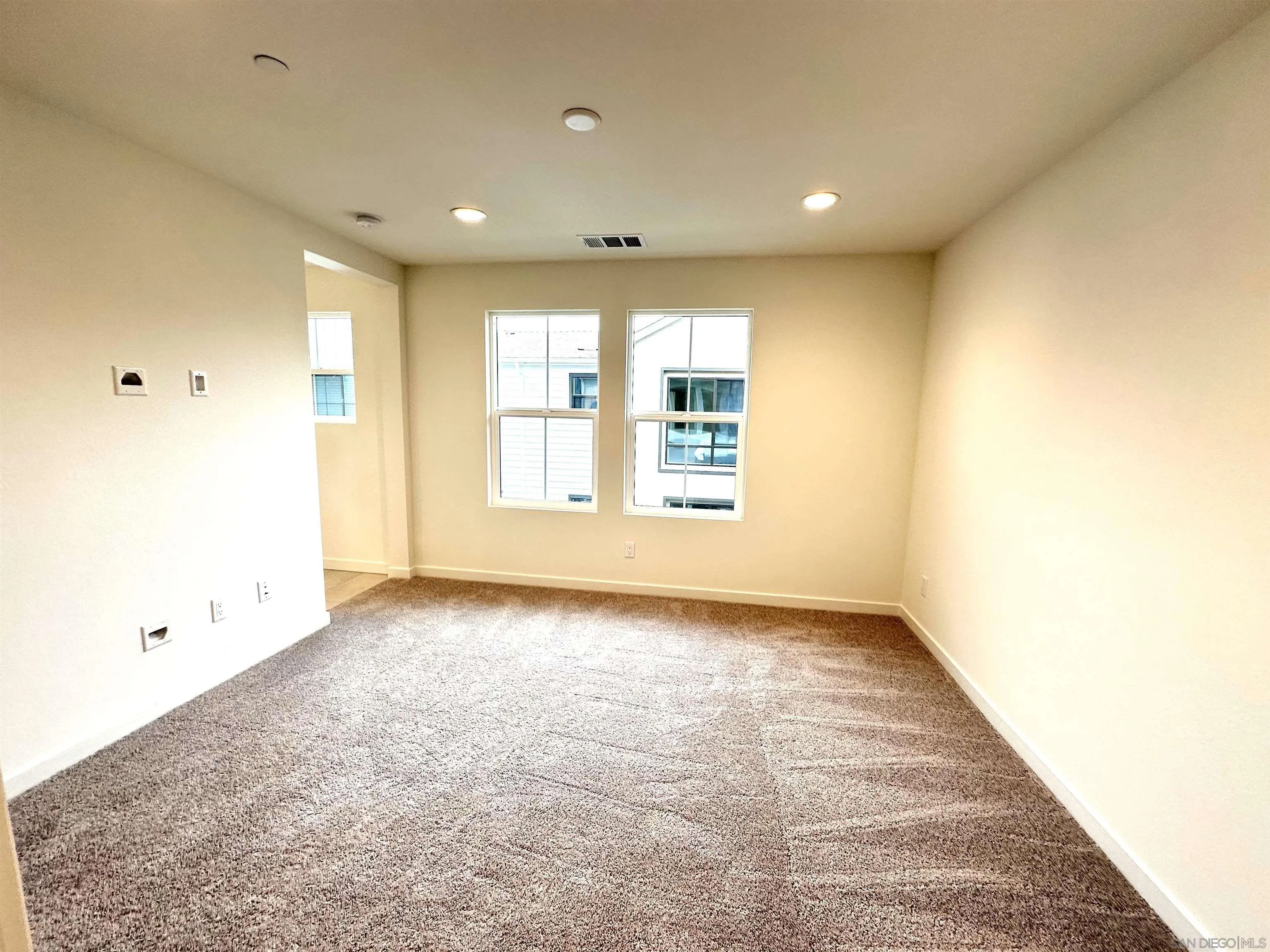 2511 Chamomile Lane Carlsbad, CA 92008 - Photo 31 of 51 a view of an empty room with a window