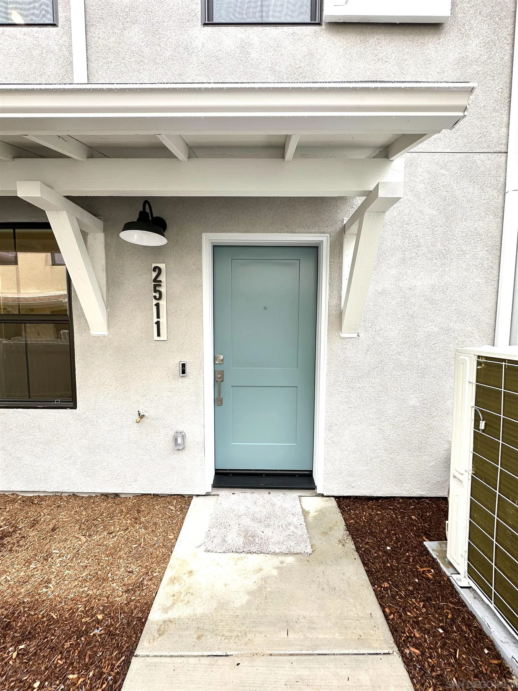 2511 Chamomile Lane Carlsbad, CA 92008 - Photo 40 of 51 a view of a entryway door of the house