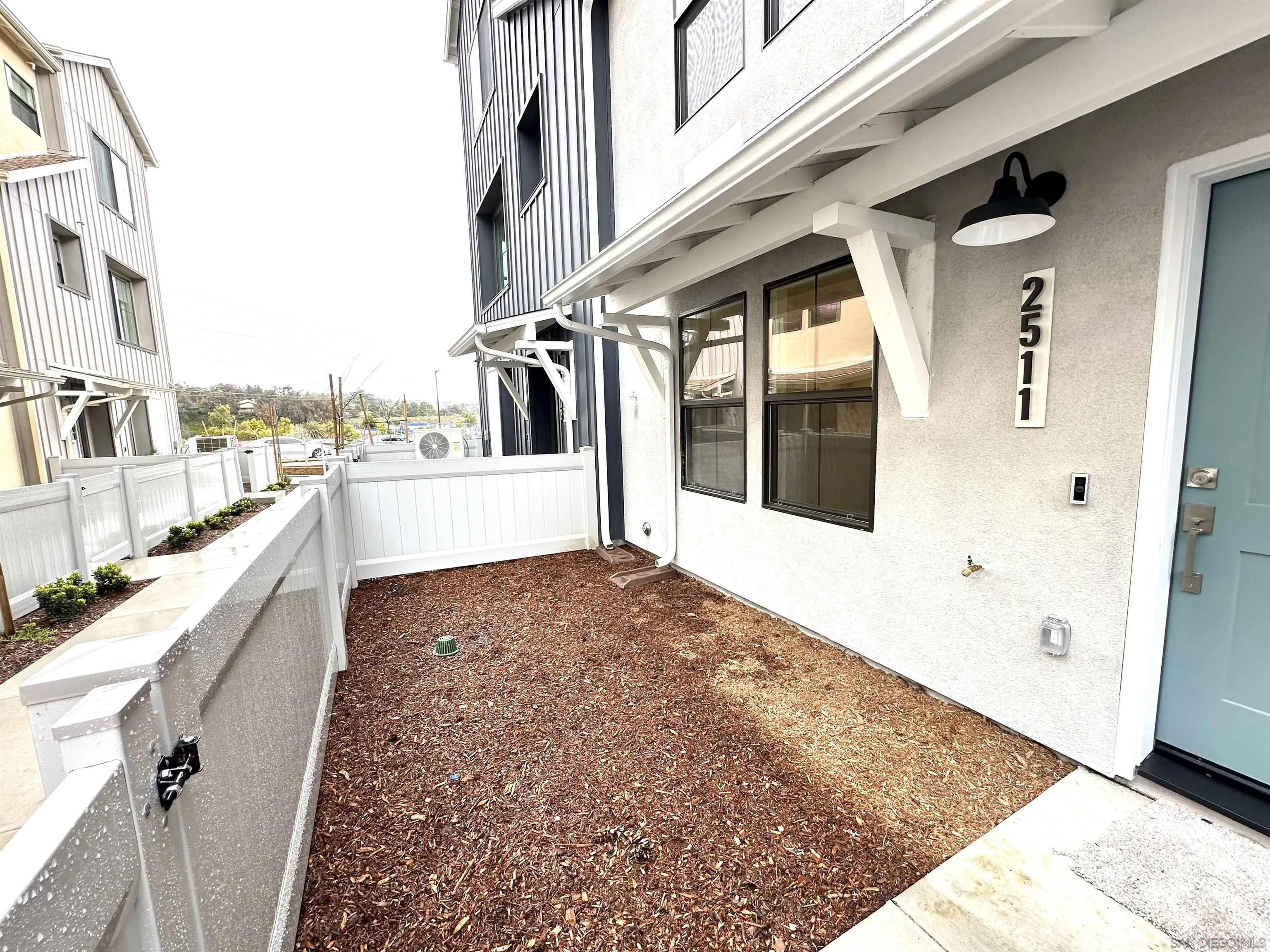 2511 Chamomile Lane Carlsbad, CA 92008 - Photo 41 of 51 a view of a balcony with large windows