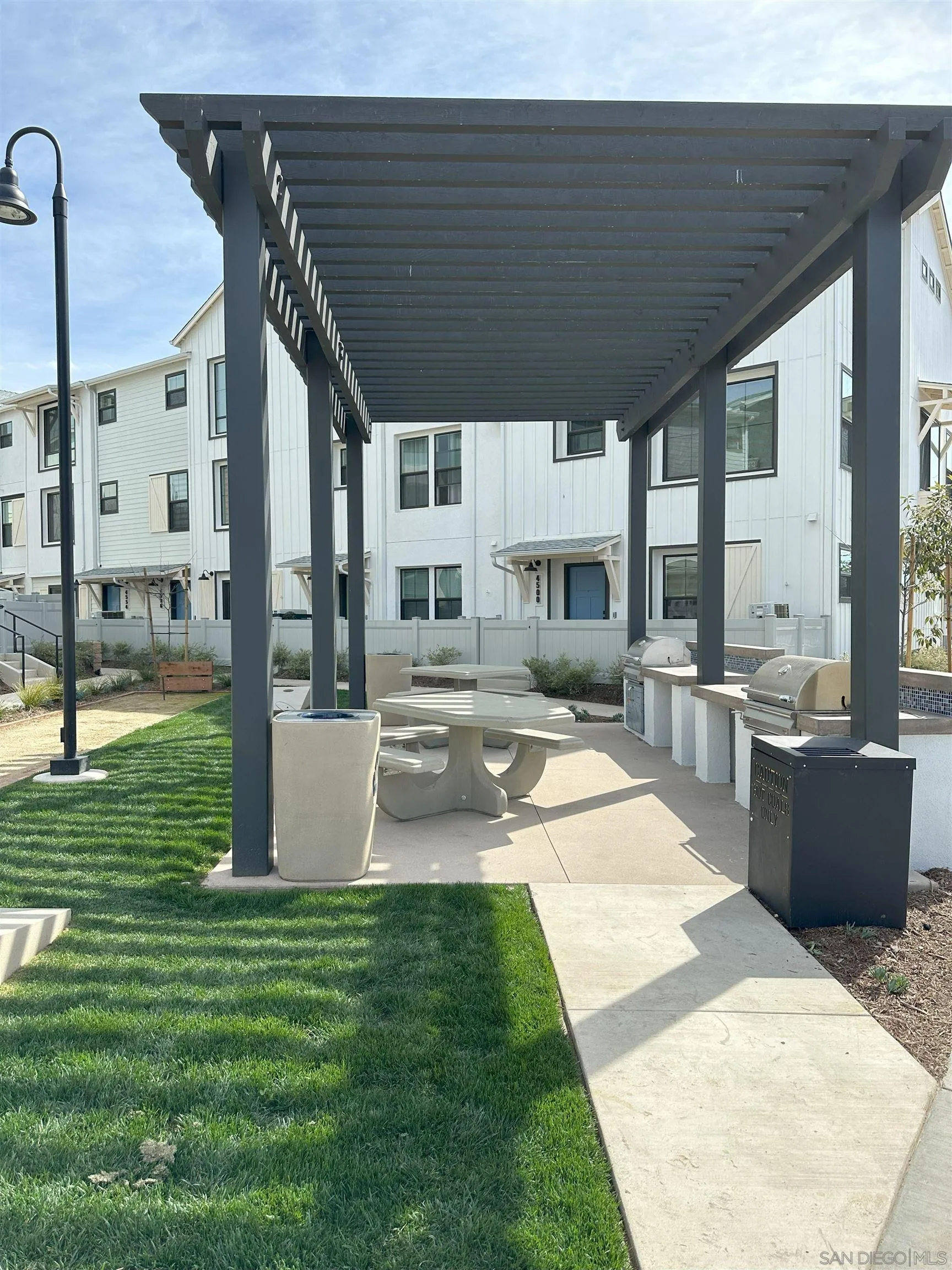 2511 Chamomile Lane Carlsbad, CA 92008 - Photo 45 of 51 a view of a swimming pool with a patio
