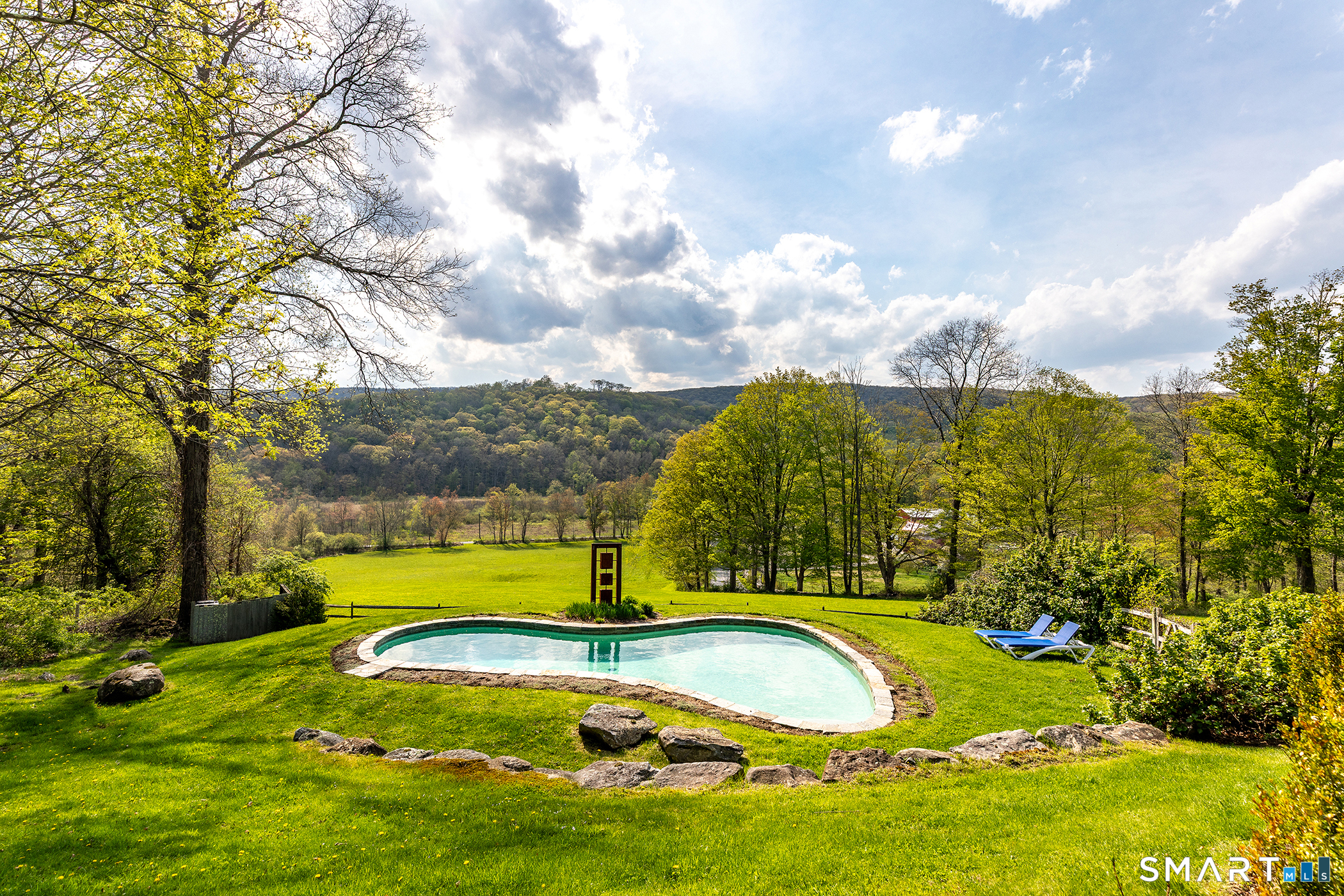 16 Anderson Acres Road Kent, CT 06785 - Photo 34 of 40 a view of a swimming pool with a yard