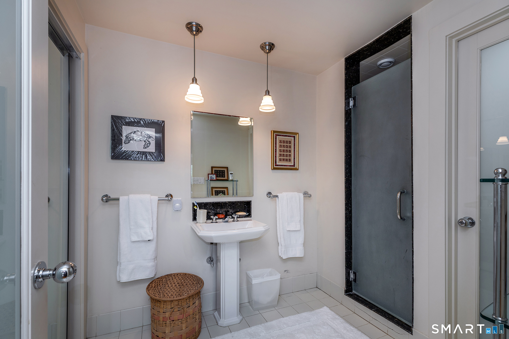 16 Anderson Acres Road Kent, CT 06785 - Photo 38 of 40 a bathroom with a toilet a sink and mirror