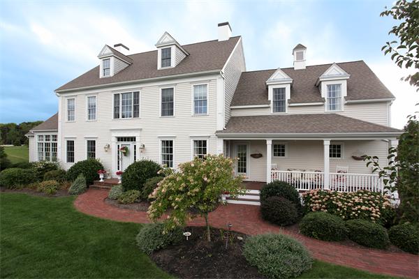 147 Tilden Road Scituate, MA 02066 - Photo 1 of 1 a front view of a house with a yard