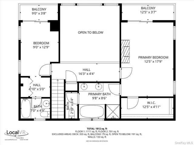 a black and white photo of a living room