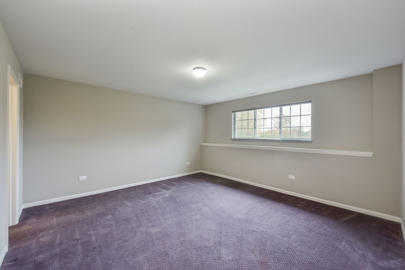 243 Bennett Drive Carol Stream, IL 60188 - Photo 18 of 23 an empty room with a window
