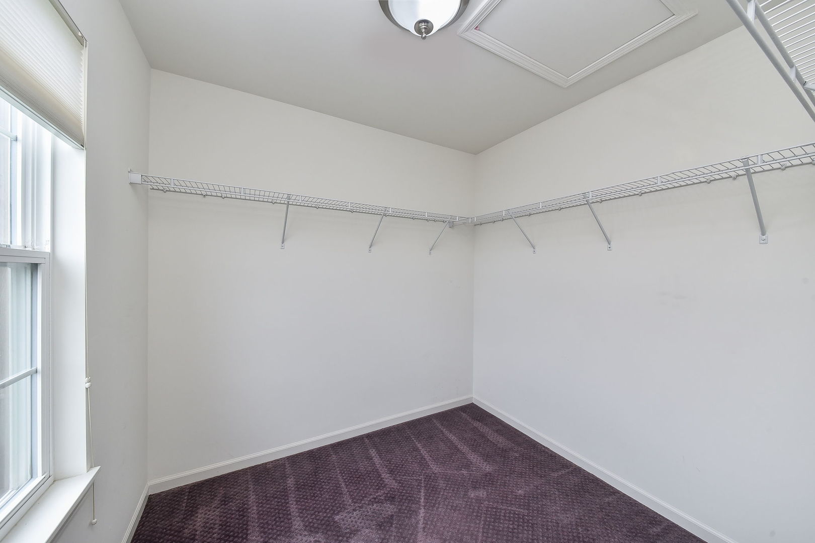 243 Bennett Drive Carol Stream, IL 60188 - Photo 8 of 23 a view of a room with racks on the wall