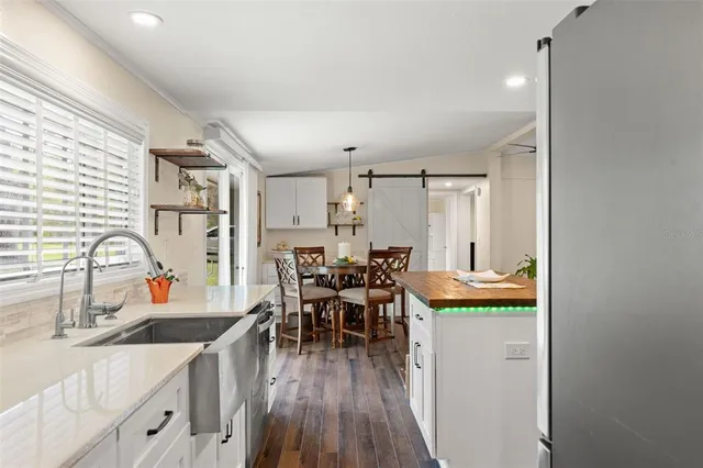 a view of a dining room with furniture