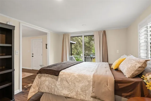 a bathroom with a shower sink and toilet