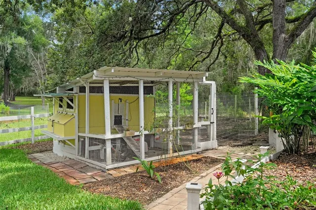 a porch with lots of green space