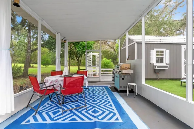 a view of a backyard with garden