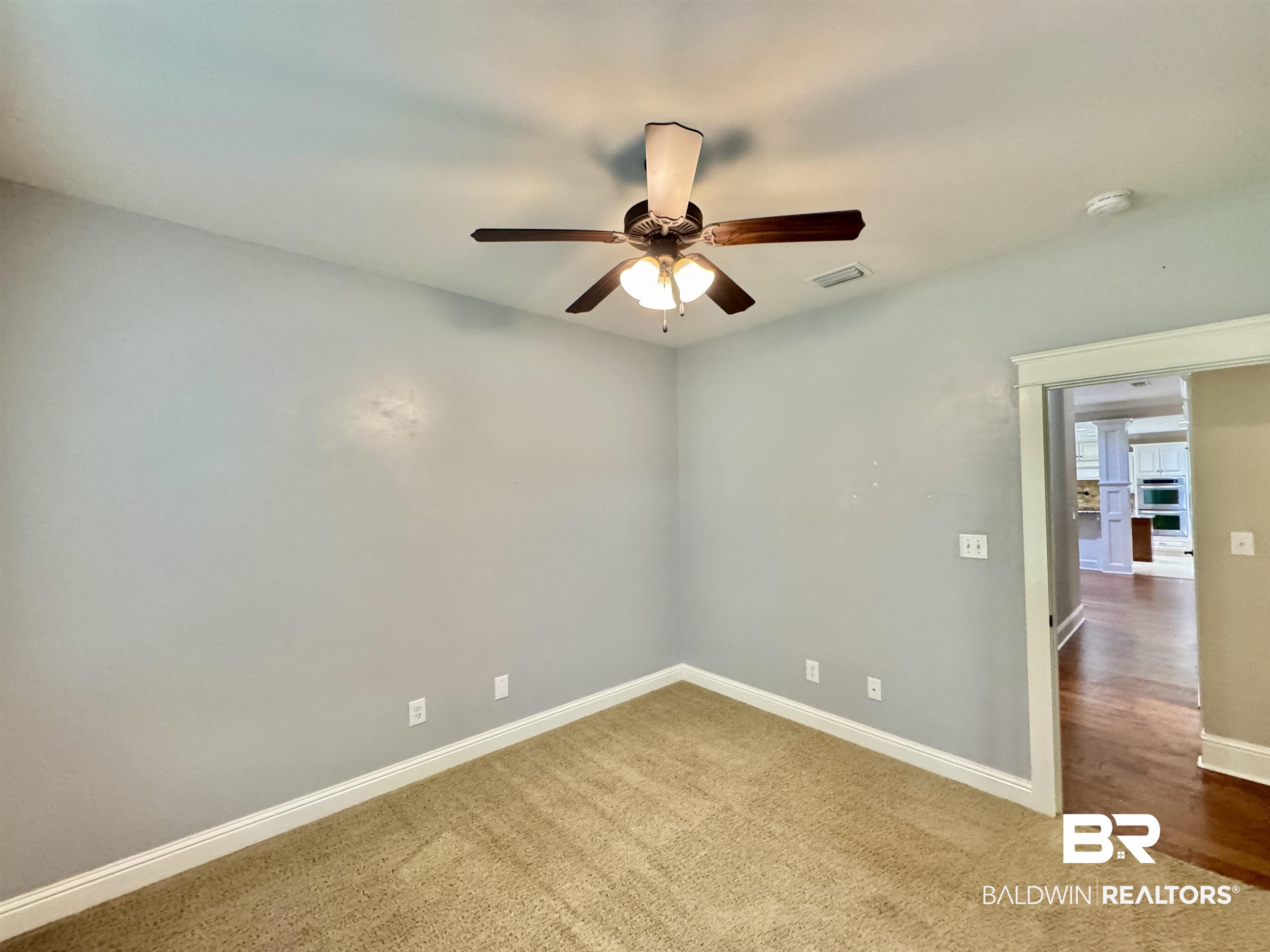10846 County Road 138 Bay Minette, AL 36507 - Photo 44 of 53 Empty room with ceiling fan and hardwood / wood-style floors