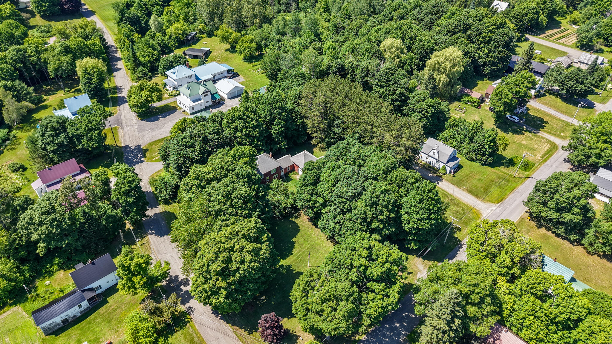 32 Willow Street Patten, ME 04765 - Photo 14 of 36 dji_fly_20260712_140010_0759_17838794619