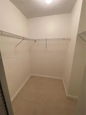 a view of small space with racks on the wall