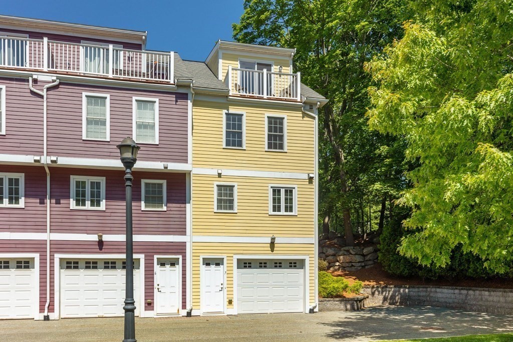 40 Brattle Street, Unit 7 Arlington, MA 02476 - Photo 2 of 25 a view of a house with a swimming pool
