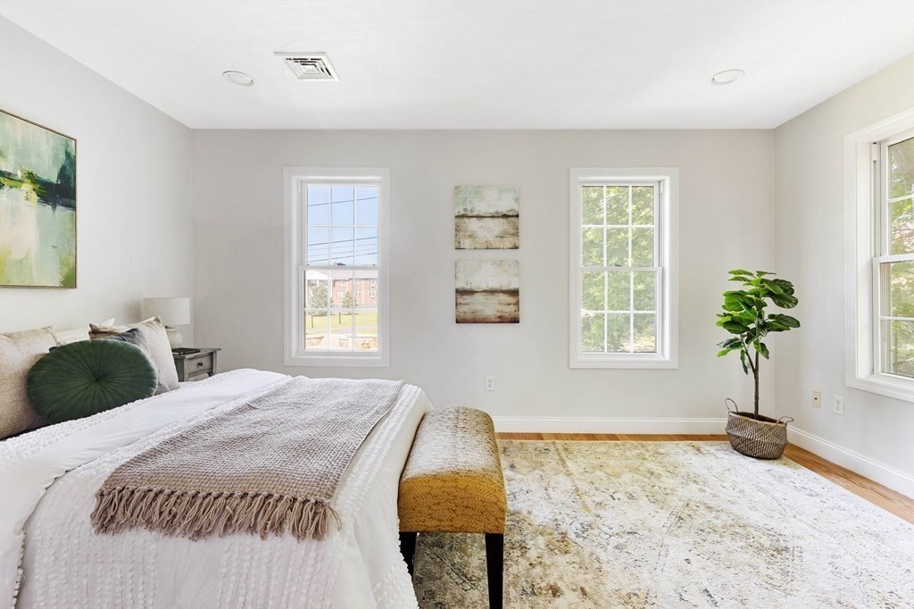 40 Brattle Street, Unit 7 Arlington, MA 02476 - Photo 10 of 25 a bedroom with a bed and window