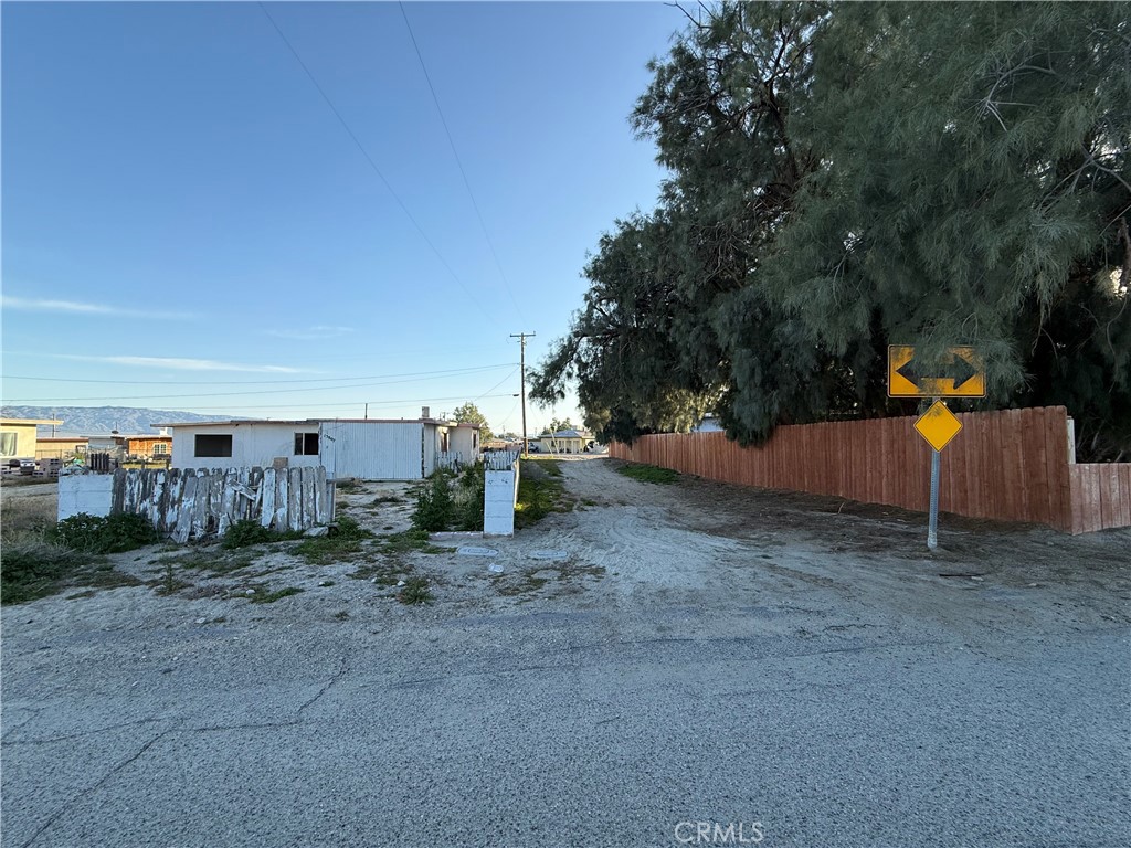 13807 Carson Street Trona, CA 93562 - Photo 21 of 37 a view of a yard with tiny trees
