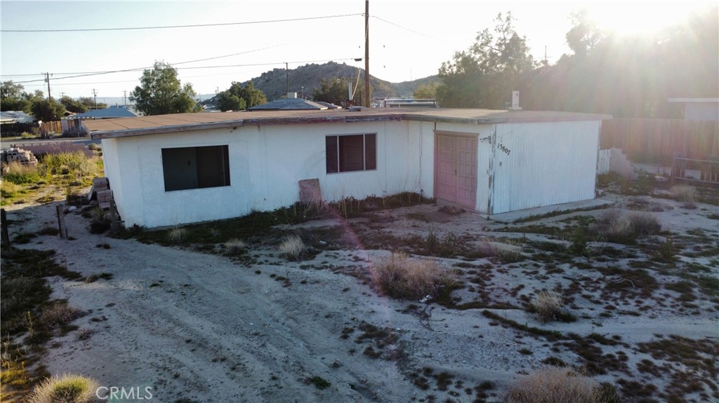 13807 Carson Street Trona, CA 93562 - Photo 3 of 37 a view of a house with a backyard