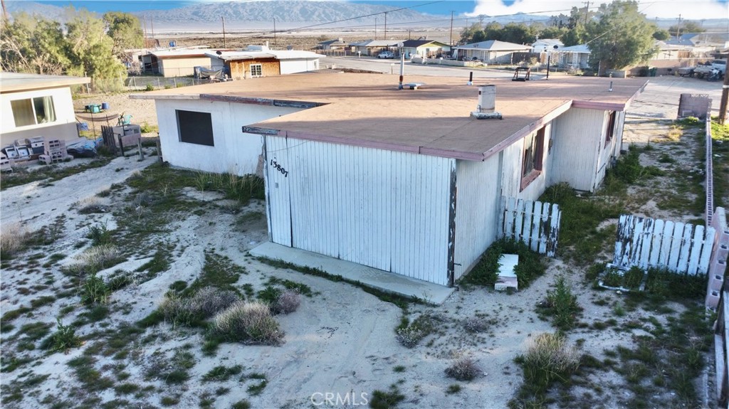 13807 Carson Street Trona, CA 93562 - Photo 5 of 37 a view of a backyard with plants and outdoor seating