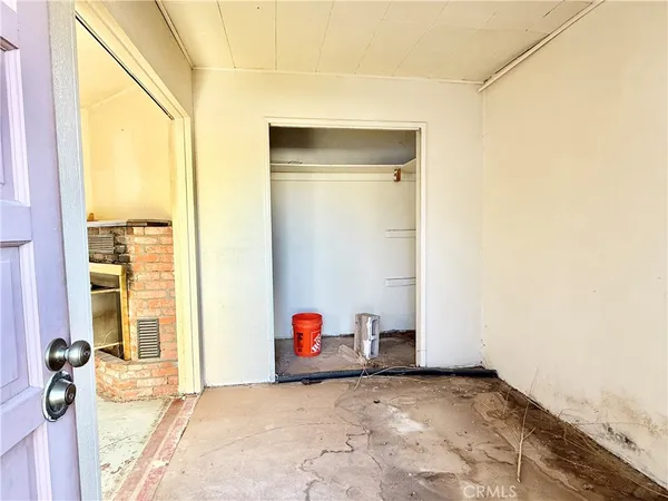 a view of a bedroom with front door