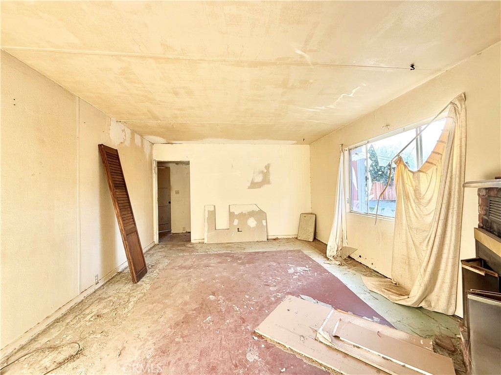 13807 Carson Street Trona, CA 93562 - Photo 8 of 37 a view of a bedroom with front door