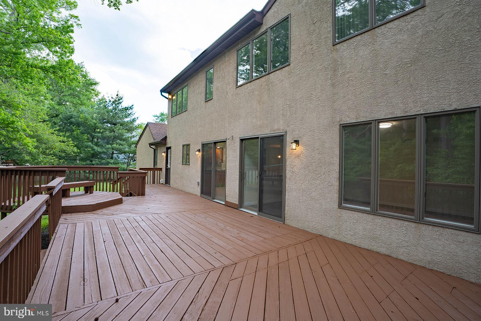 491 Kings Road Yardley, PA 19067 - Photo 50 of 52 a balcony with wooden floor and barbeque oven
