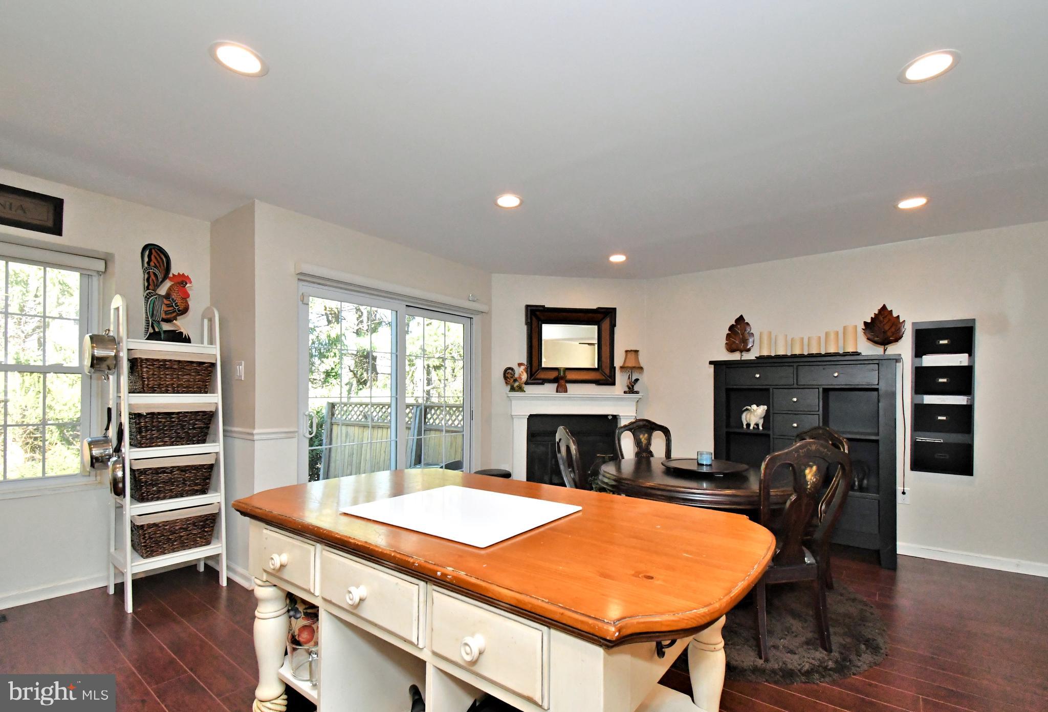 1903 Red Maple Grove Ambler, PA 19002 - Photo 12 of 32 a living room with furniture a flat screen tv and a fireplace