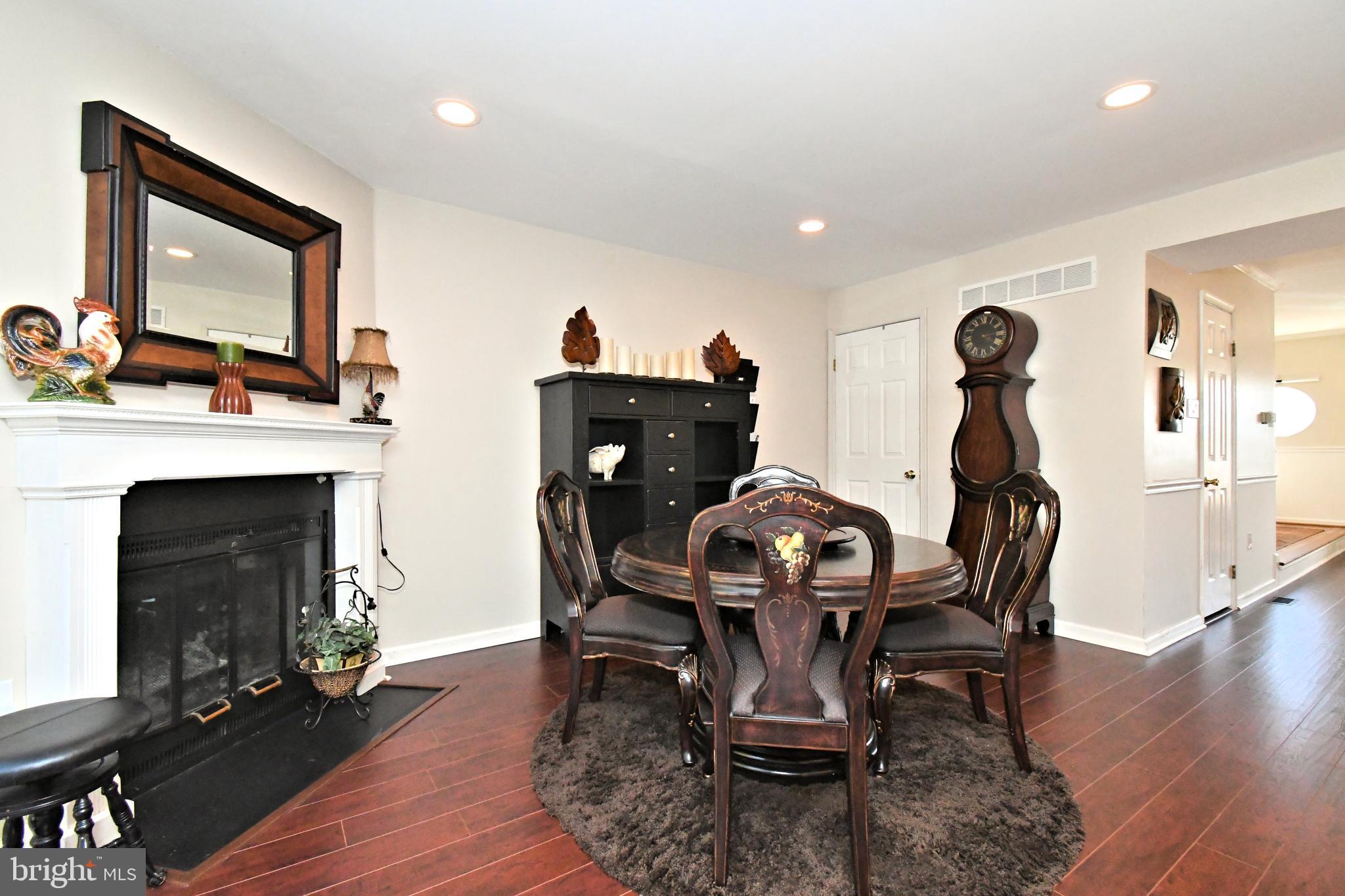 1903 Red Maple Grove Ambler, PA 19002 - Photo 17 of 32 a view of a dining room with furniture and wooden floor