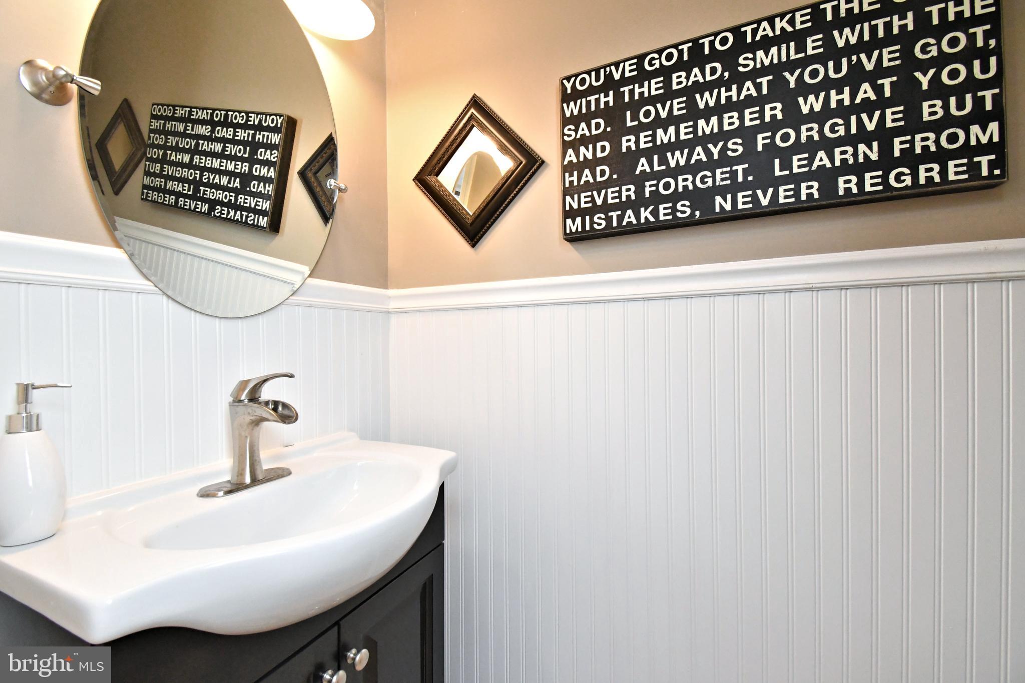 1903 Red Maple Grove Ambler, PA 19002 - Photo 19 of 32 a bathroom with a sink and a mirror