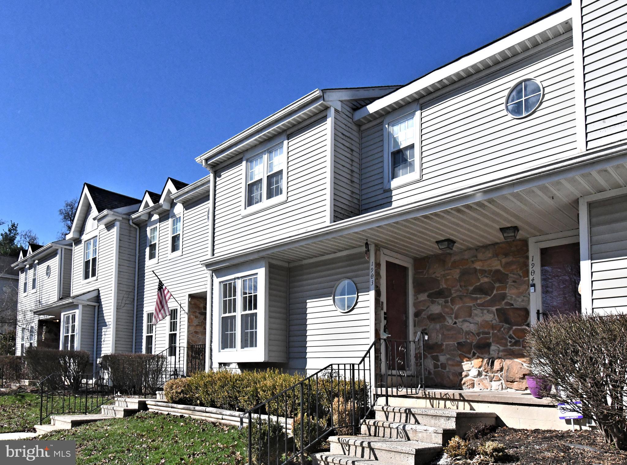 1903 Red Maple Grove Ambler, PA 19002 - Photo 2 of 32 a front view of a house with garden