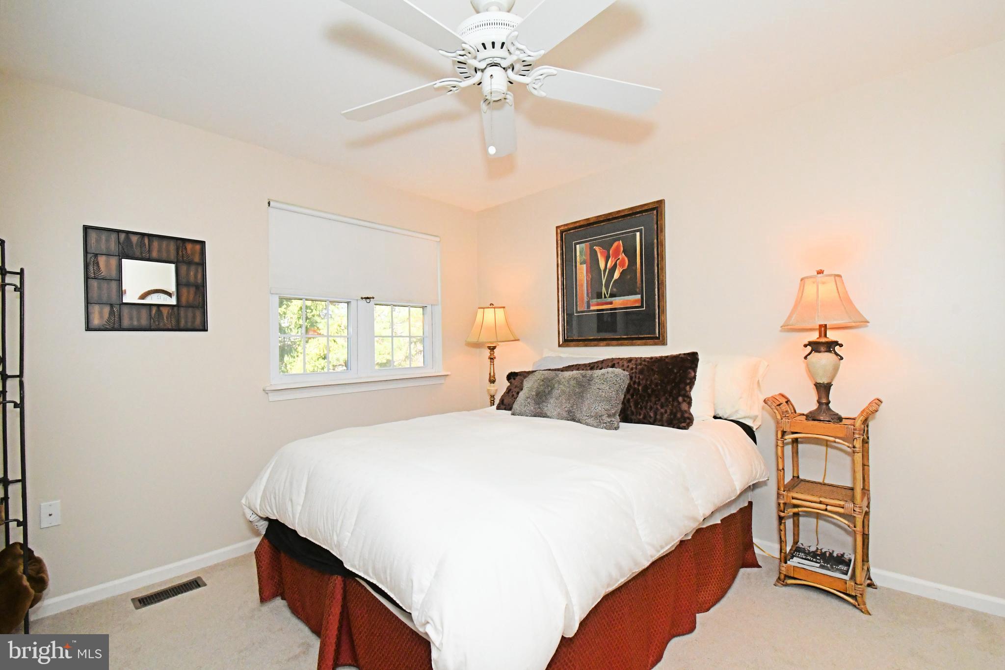 1903 Red Maple Grove Ambler, PA 19002 - Photo 21 of 32 a bedroom with a bed and a table