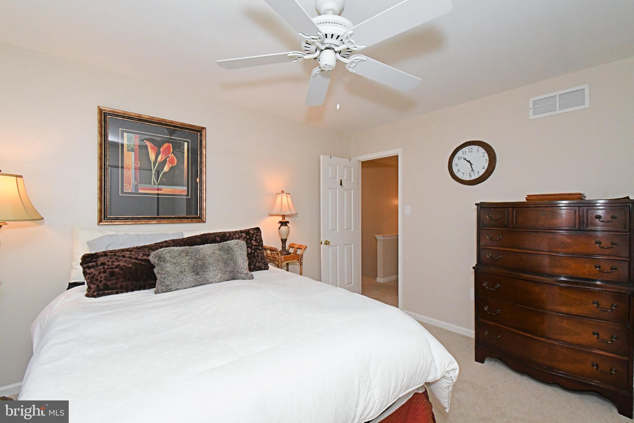 1903 Red Maple Grove Ambler, PA 19002 - Photo 22 of 32 a bedroom with a bed and a closet