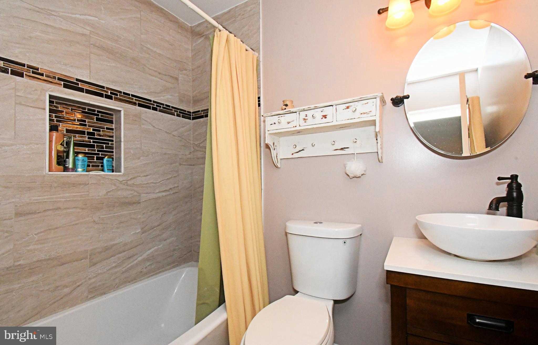 1903 Red Maple Grove Ambler, PA 19002 - Photo 24 of 32 a bathroom with a toilet a sink and bathtub