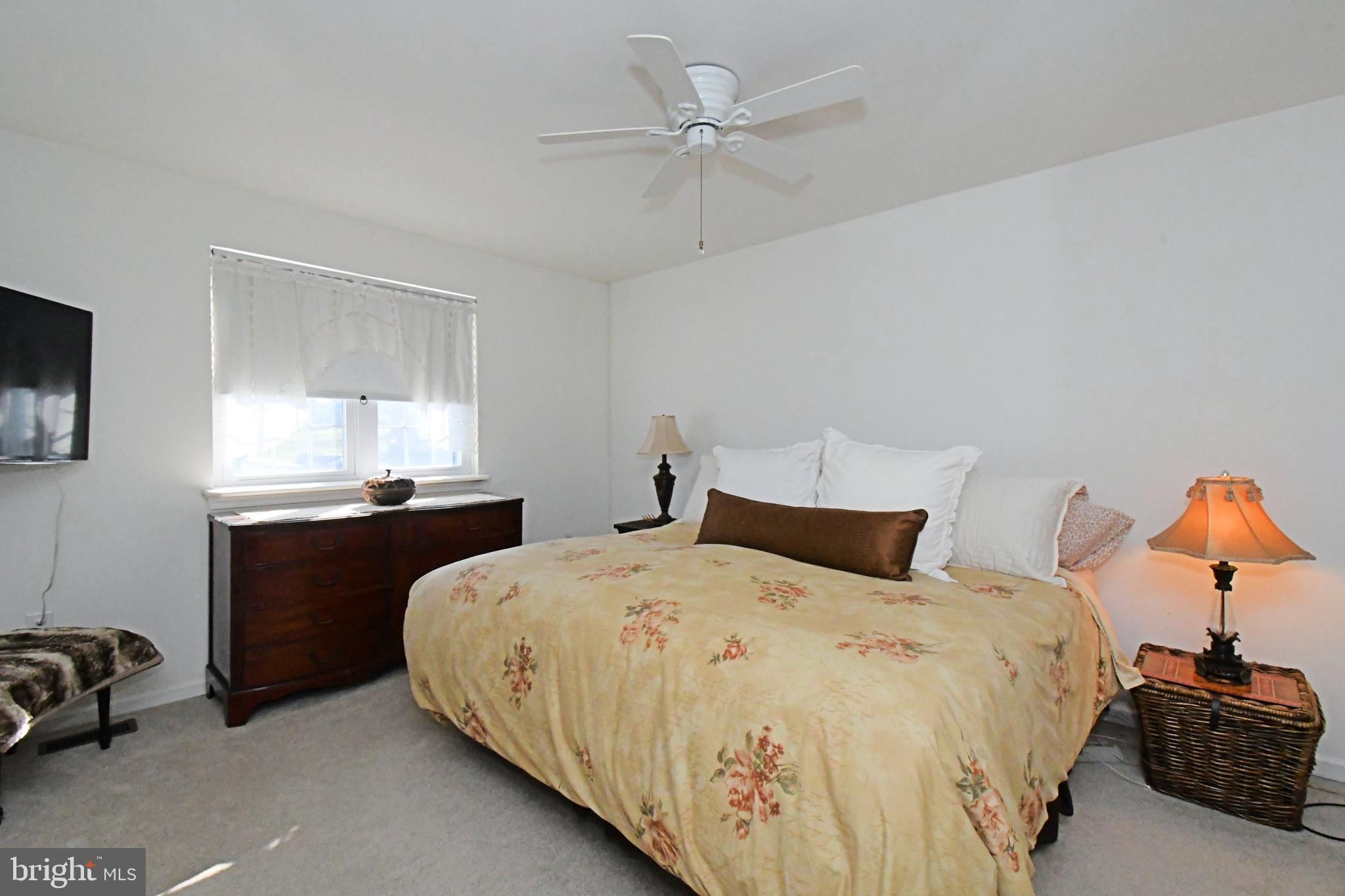 1903 Red Maple Grove Ambler, PA 19002 - Photo 25 of 32 a bedroom with a bed and a window