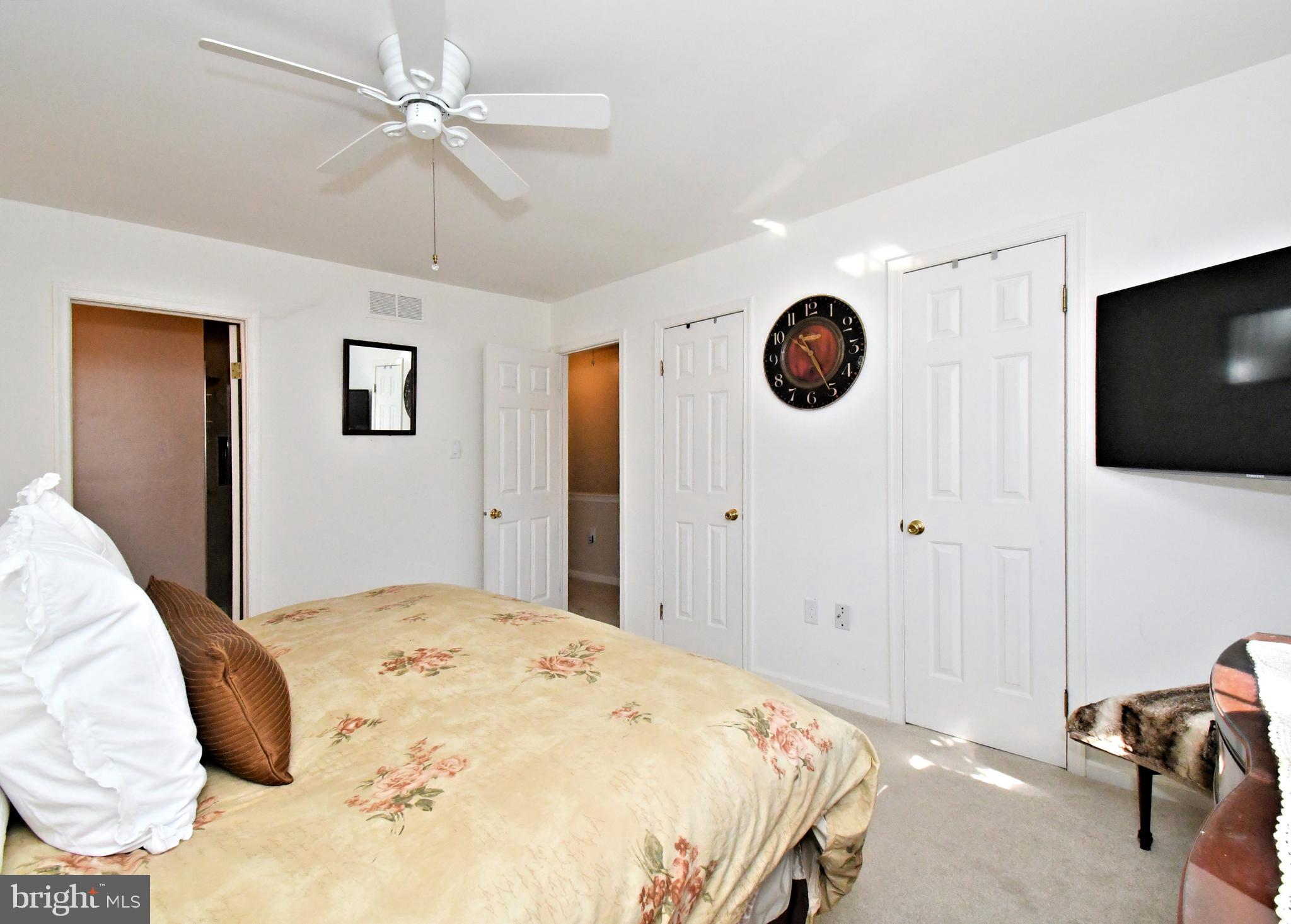 1903 Red Maple Grove Ambler, PA 19002 - Photo 28 of 32 a bedroom with a bed and a flat screen tv