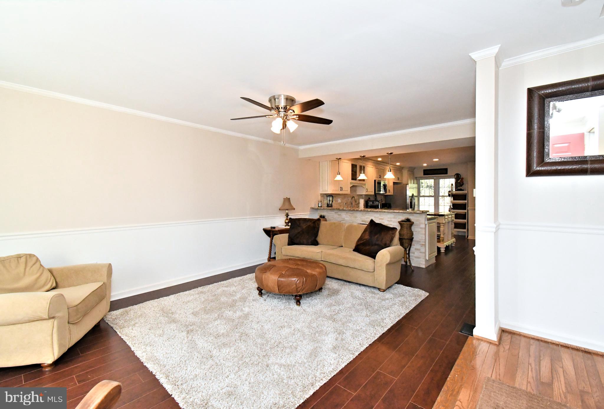 1903 Red Maple Grove Ambler, PA 19002 - Photo 3 of 32 a living room with furniture and a wooden floor