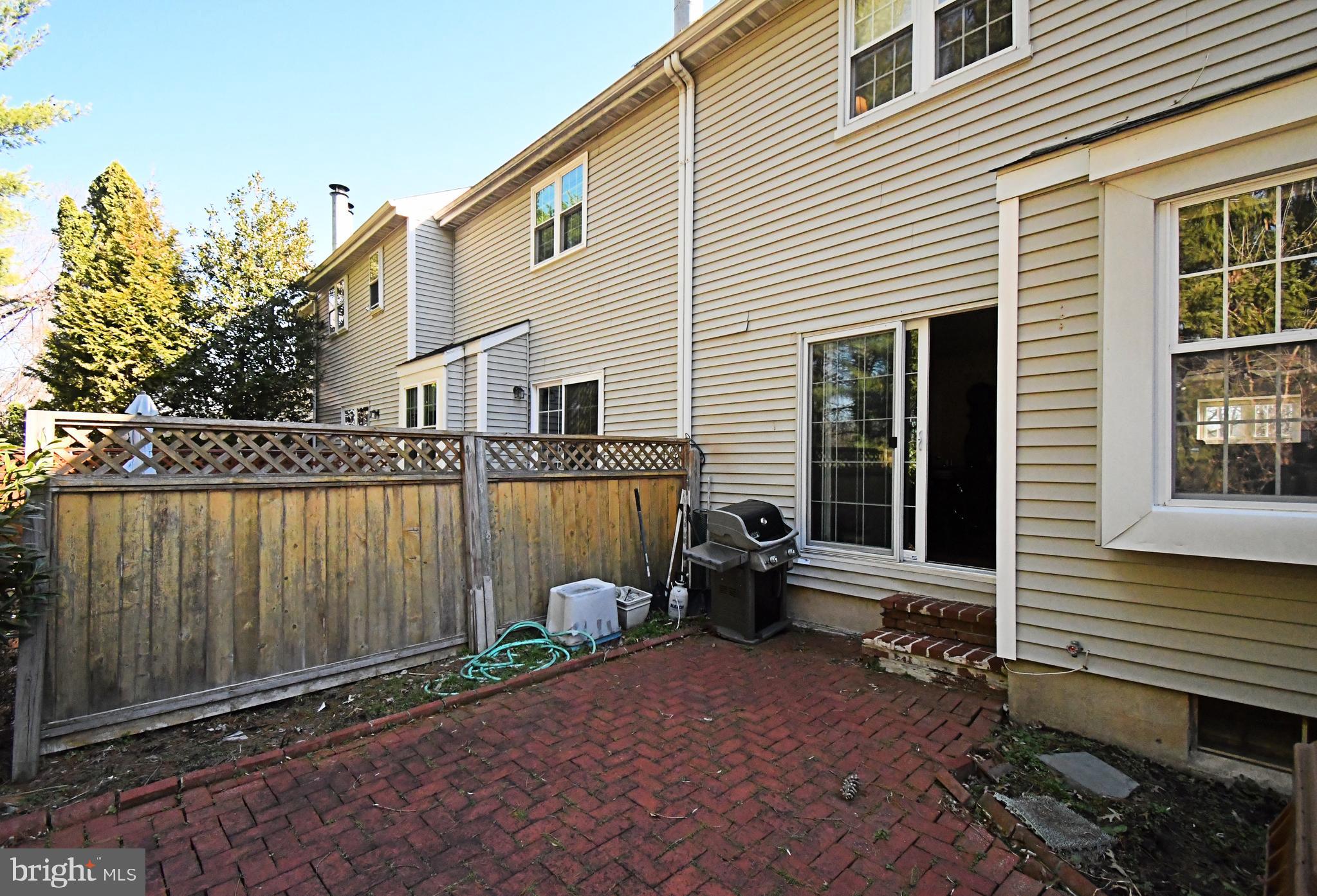 1903 Red Maple Grove Ambler, PA 19002 - Photo 31 of 32 a view of a house with backyard and sitting area