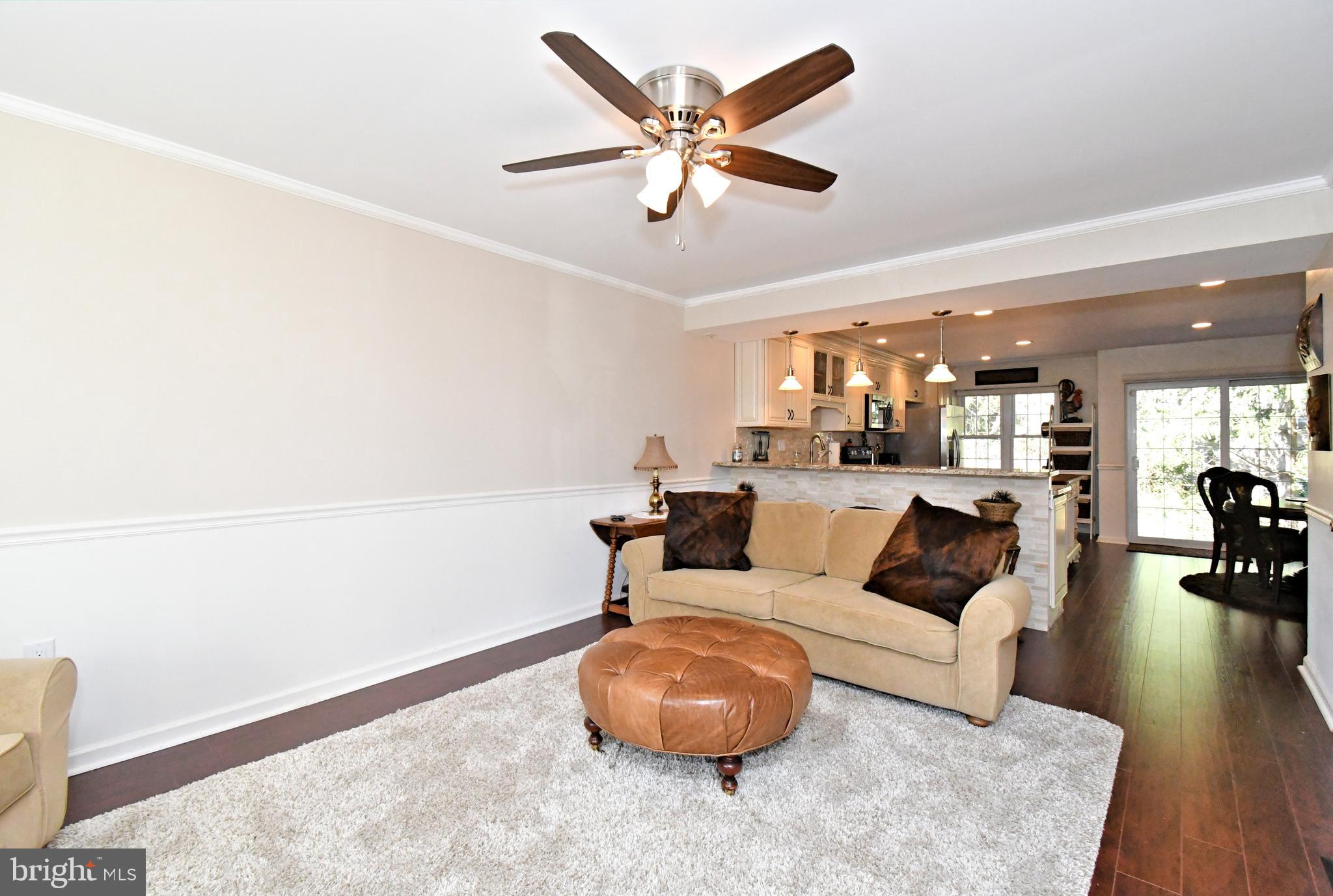 1903 Red Maple Grove Ambler, PA 19002 - Photo 4 of 32 a living room with furniture and a large window