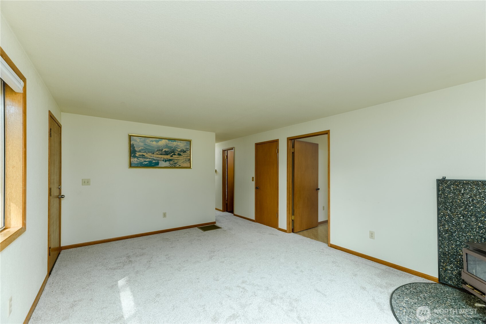 456 Fasola Road Sequim, WA 98382 - Photo 8 of 34 a view of an empty room and a window